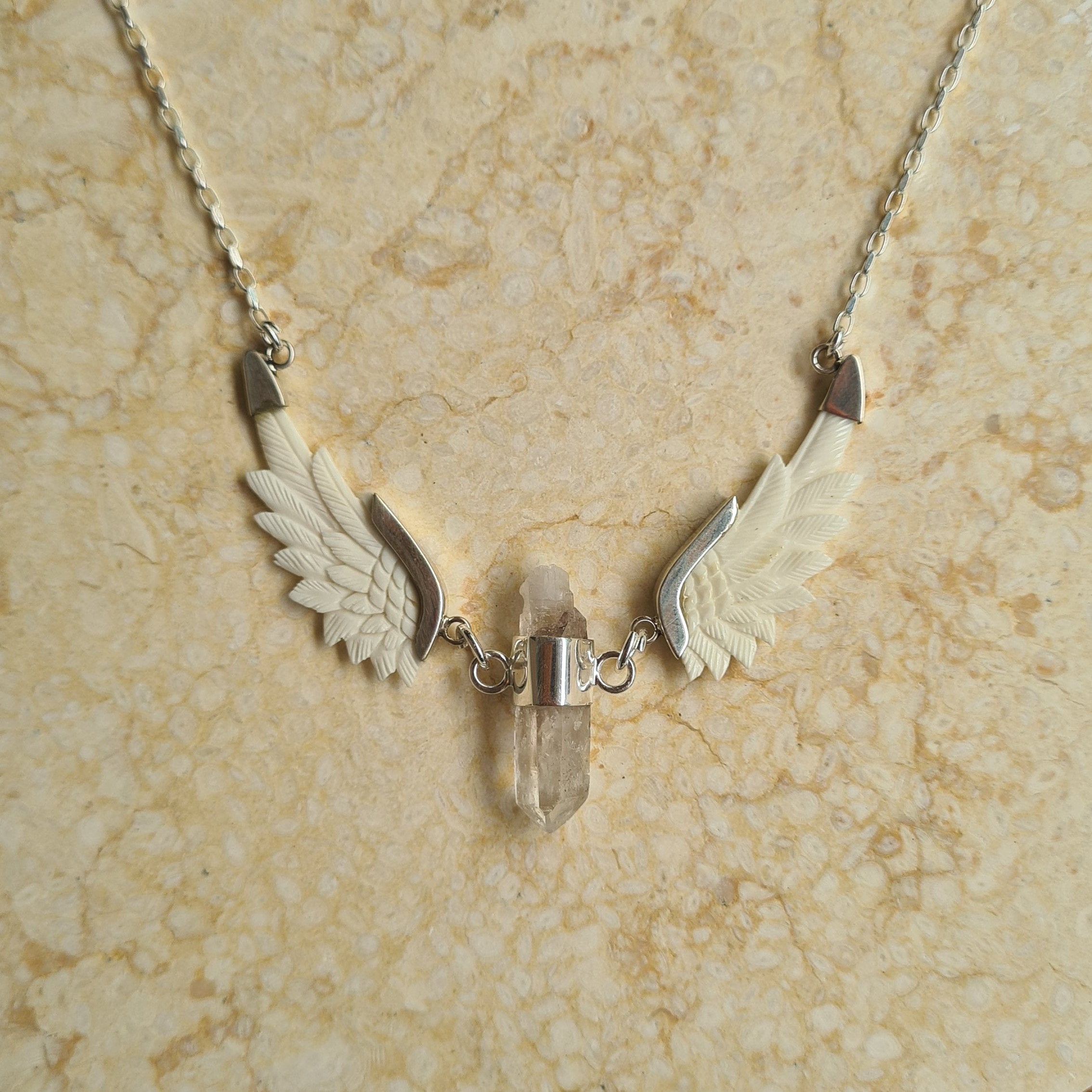 Orion Pendant Clear Quartz Bone Wings Silver