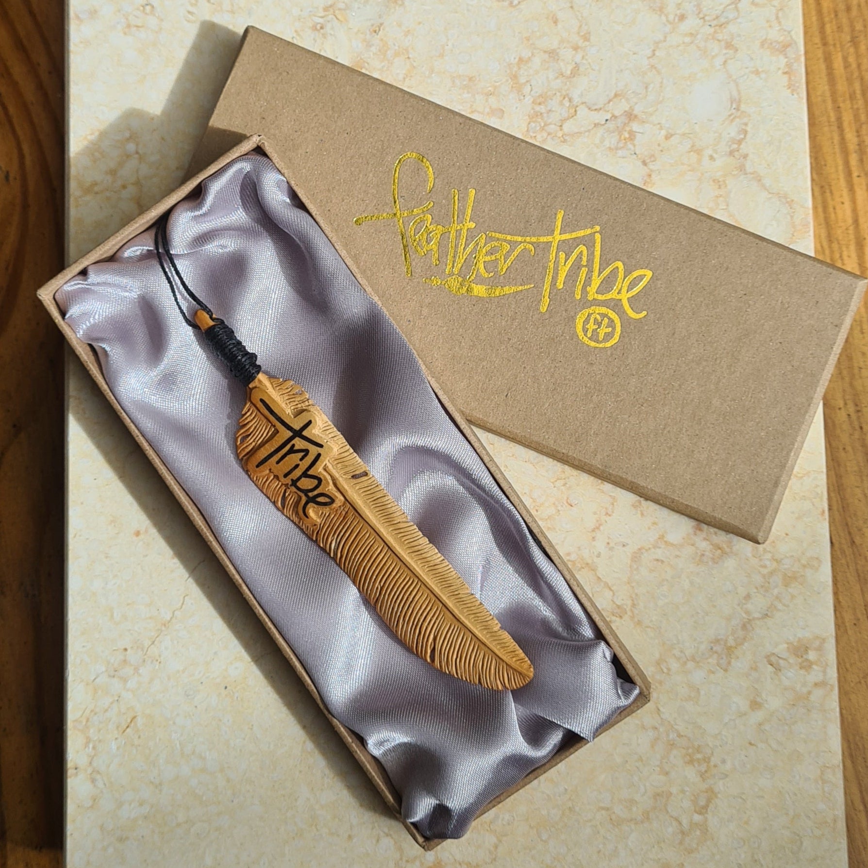 Limited Edition Tribe Flight Feather hand-carved out of Sandalwood in a gift box