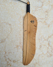 Load image into Gallery viewer, Limited Edition Tribe Flight Feather hand-carved out of Sandalwood, numbered on the back
