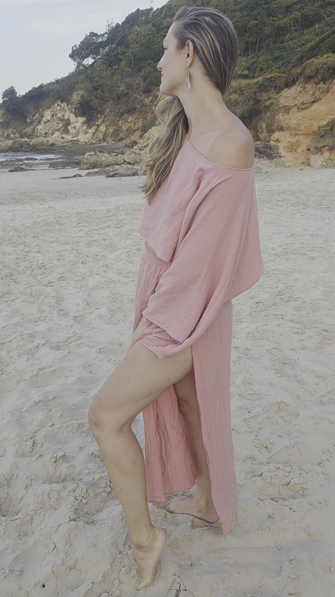 Aurora Earrings by Feather Tribe worn by Mariette on the Beach